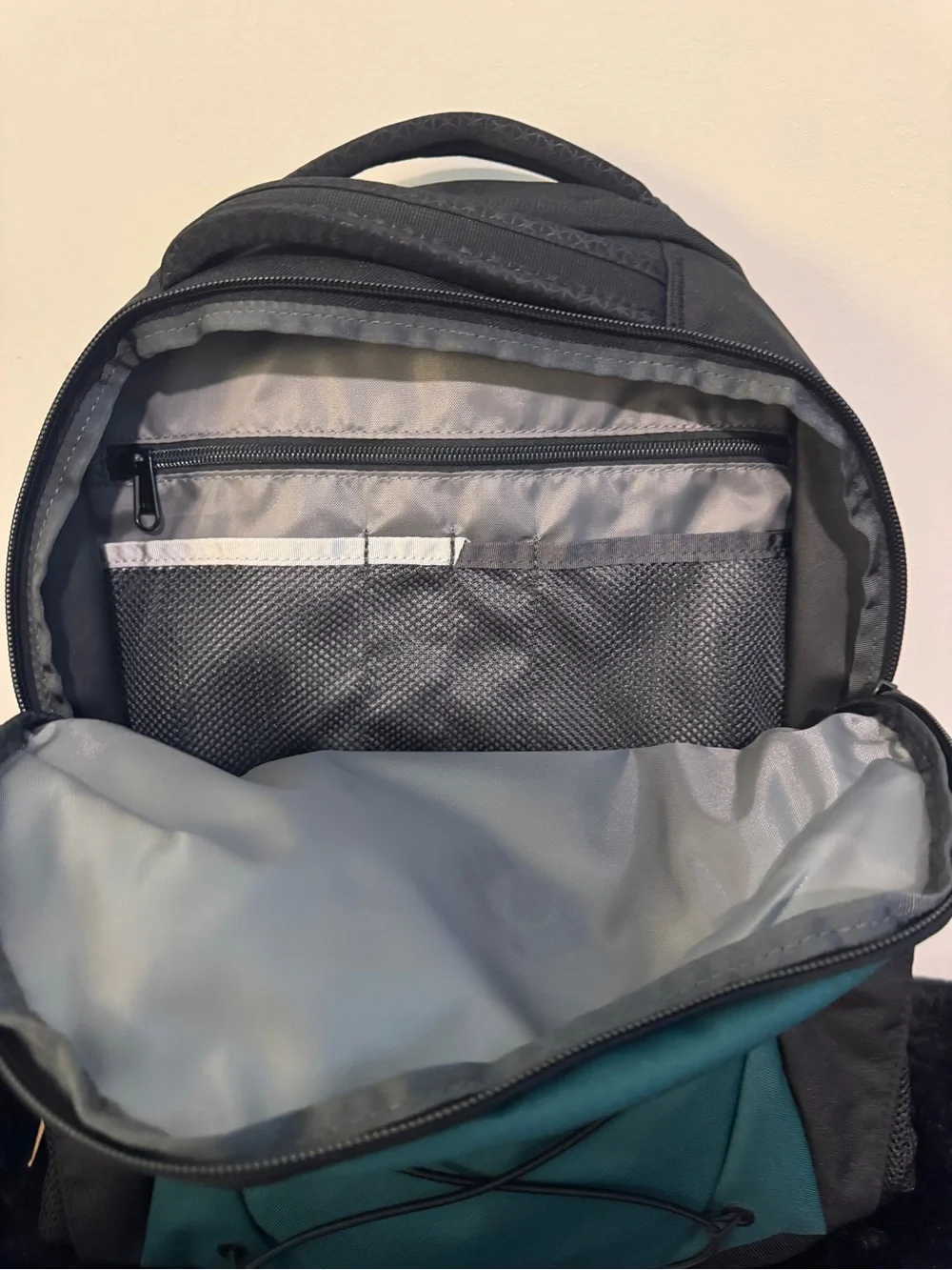 The North Face Teal and Black Daypack Backpack with Bungee Cord